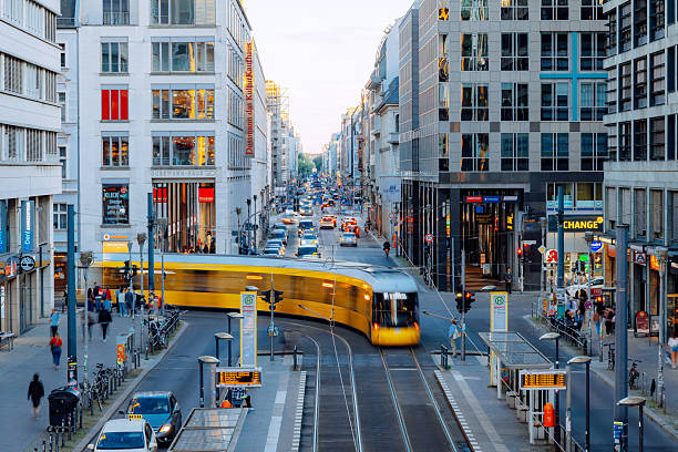 Busy Friedrichstraße in Berlin with Pedestrians and Trams